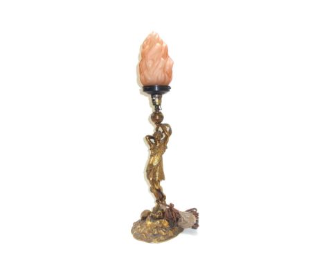 A gilt bronze figural table lamp, late 19th century, modelled and cast with a young lady atop a shell cast naturalistic base 