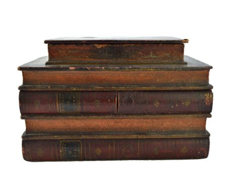 A George III novelty tea caddy, formed as a stack of books, the sliding spine revealing a lock, the interior with three lidde