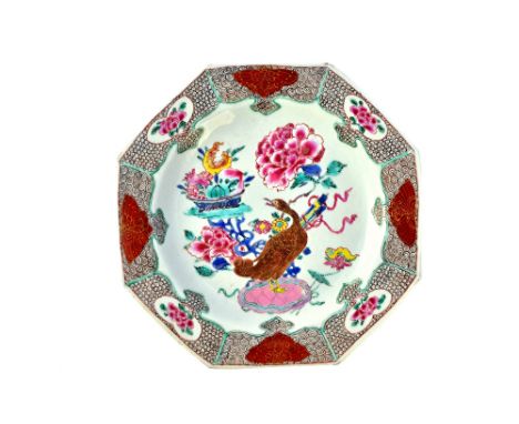 A set of six Chinese famille-rose plates, Yonzheng/early Qianlong, each painted with a duck standing amongst peony and auspic