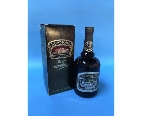 A bottle of Bowmore Islay singe malt deluxe Scotch whisky