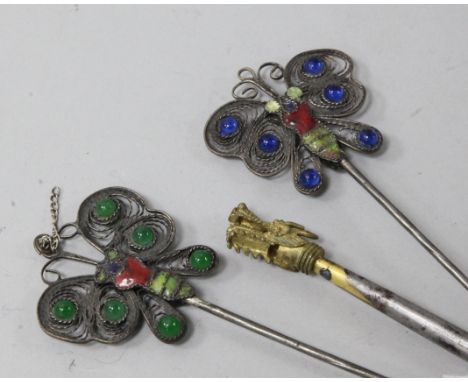Three metal, glass and enamel hair ornaments