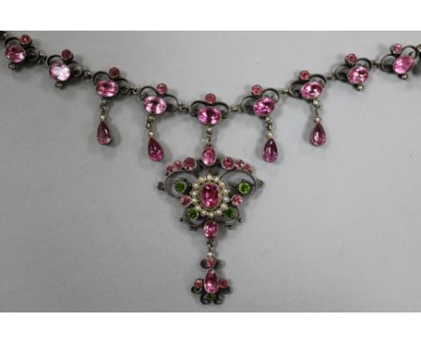 An early 20th century sterling silver, split pearl and multi paste set drop pendant necklace, pendant 53mm.