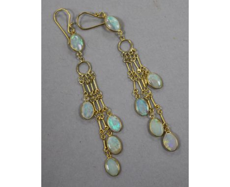 A pair of 14ct gold and white opal multi drop earrings, 49mm.