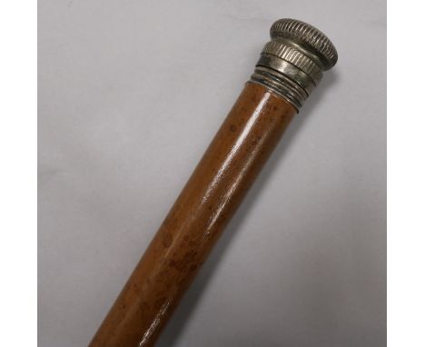 A white mounted tippling stick