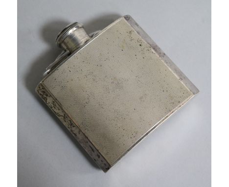 A 1930's engine turned silver hip flask, Birmingham, 1936, 97mm