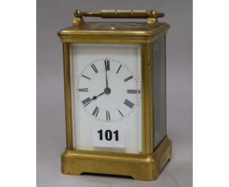 A gilt brass carriage clock, by Henri Jacot, Together with its original numbered key and numbered outer case. height 13.5cm