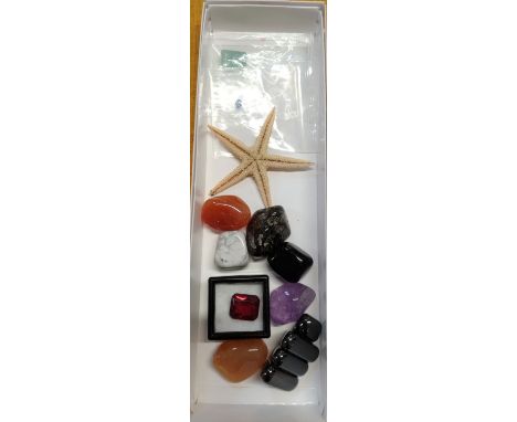 A synthetic Corundum (Ruby) 10ct, an Emerald and a Sapphire, ten precious stones including Amethyst and Hematite and a Starfi