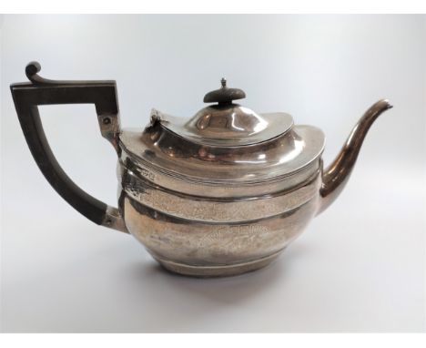 A sterling silver teapot Chester 1795 marks rubbed. 395g 