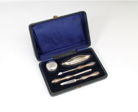 G &amp; C Ltd, Birmingham, 1918, comprising five pieces, to include buffer, glass jar with silver lid, etc.* Some steel eleme