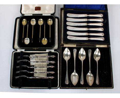 in fitted case, 6in. (15.2cm.) long, together with five silver grapefruit spoons in fitted case (one piece missing from each)