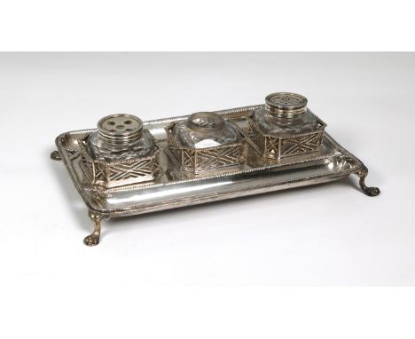 Samuel Herbert &amp; Co., London 1758, the rectangular stand with rounded angles and coil moulded borders, with a silver moun