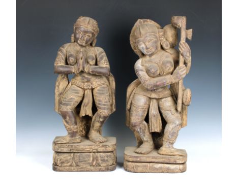 carved dancing and playing lute style instrument, approximately 24in. (61cm.) high. (2)*Some age related shrinkage cracks etc