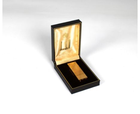 Dunhill lighter -&nbsp; Marked US.RE 24163 Patented, gold plated engine turned case.
