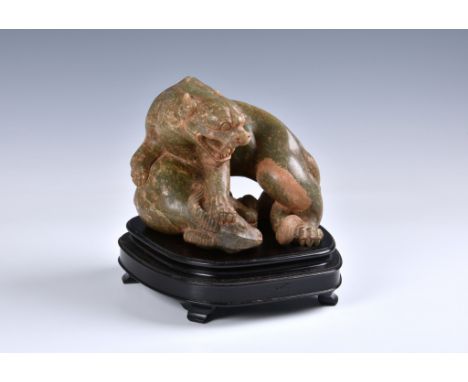 with certificate stating Ming period (1368-1644), but possibly later, the dynamically carved figure of the jaguar with it's f