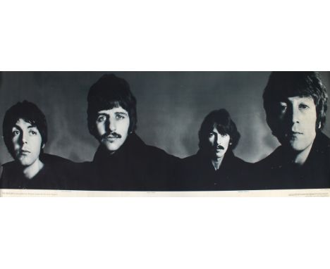 First Edition Print issued by the Daily Express published in 1967 featuring all four Beatles. 14½ x 40in. (37.101.5cm.).* Ver