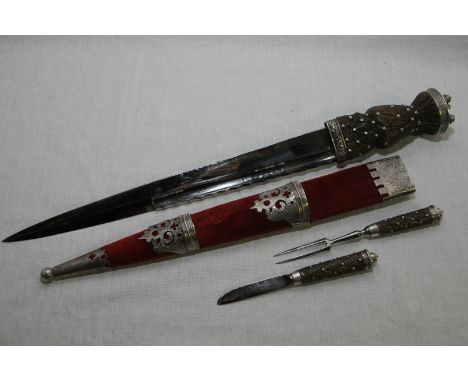 19th C Scottish Dirk with 12.5 inch blade with single fuller and double edge to the last third with shaped back strap with ca