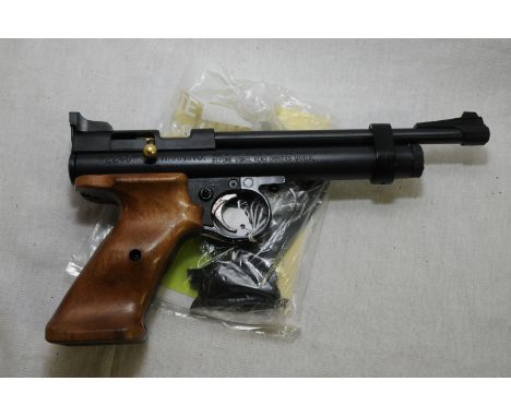 Crosman 2240.22 air pistol with additional grips, manual etc