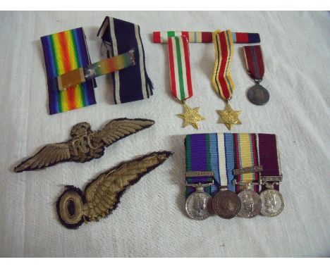 Royal Flying Corps wings embroidered badge and an `O' winged badge, selection of medal ribbons, group of ER II miniatures com