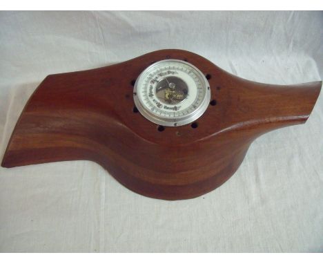 Barometer set in part of a wooden propeller