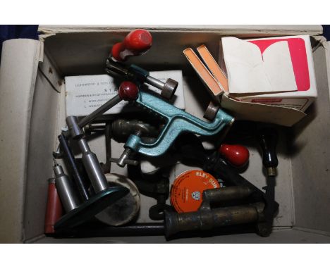 Box containing various gun accessories including reloading tools, de-cappers, shot measures, prima's etc 