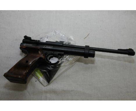Crosman 2300T .22 air pistol with additional grips, manual etc