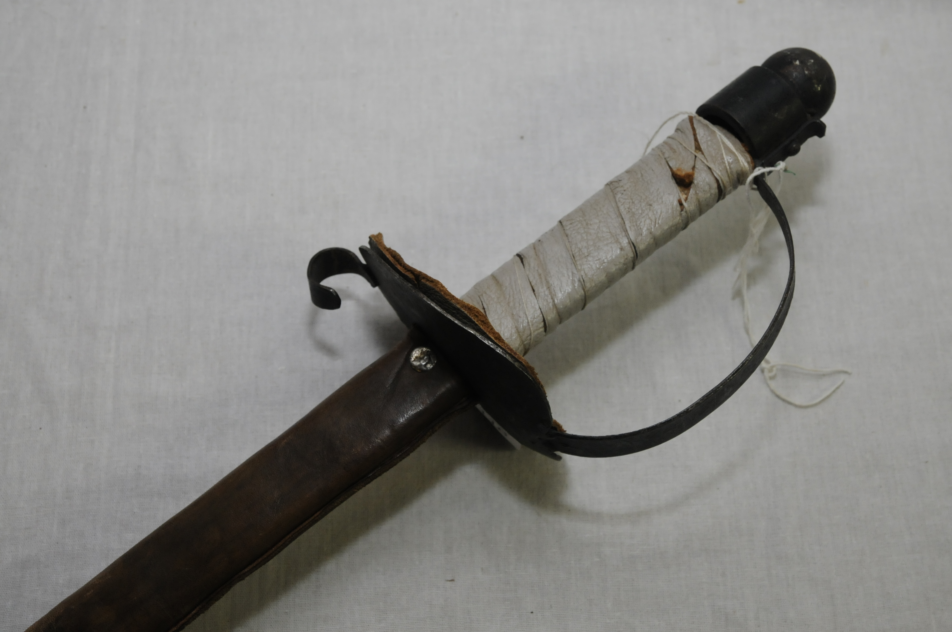 Copy of an English civil war period straight sword with leather sheath ...