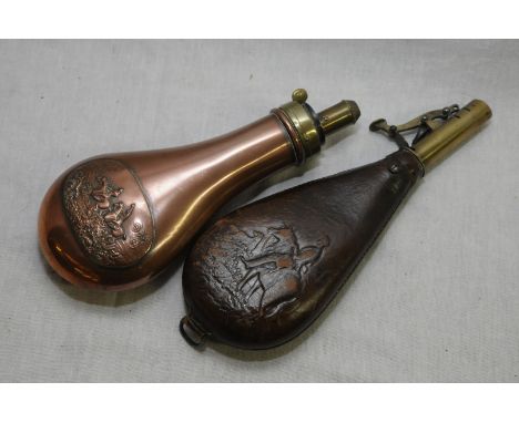 Brass and copper powder flask with oval panel depicting hunting scene and a leather shot flask with embossed detail of highla