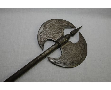 Late 19th C Indian double headed axe with steel shaft and various engraved detail (length 73cm) 