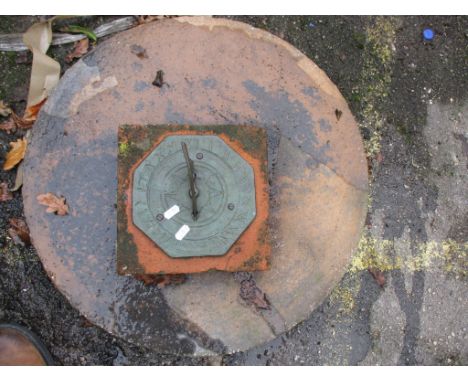 SUNDIAL MOUNTED ON TERRACOTTA TOGETHER WITH A MOULDED TABLE TOP, WIDTH APPROX 59CM