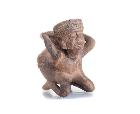 MAYAN POTTERY VASE modelled as a kneeling male figure carrying a vessel on his back9.5cm high