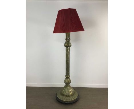 EASTERN BRASS FLOOR LAMP EARLY 20TH CENTURY  pierced and decorated overall with panels of script and interwoven stylised patt