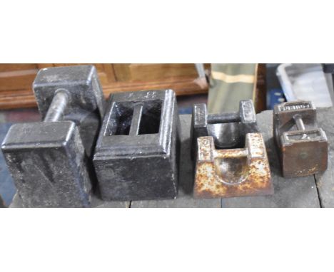 A Collection of Five Cast Iron Vegetable Scale Weights 