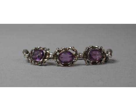 A Victorian Three Section Amethyst and Silver Brooch on Later Five Section Chain to Form a Bracelet 