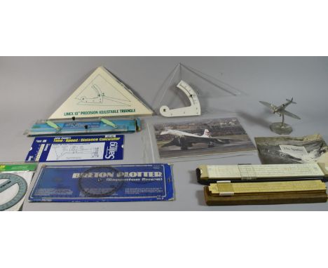 A Collection of Navigation Equipment, Two Vintage Slide Rules, Spitfire Model and a Limited Edition Concorde Photograph 