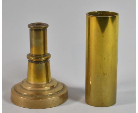 A Small Brass Cylinder and a Stepped Candlestick 
