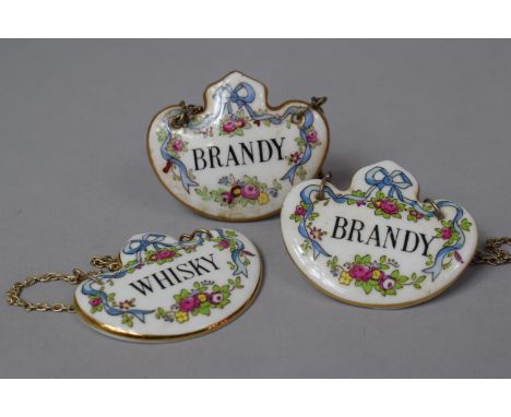 A Set of Three Ceramic Decanter Labels by Crown, 2x Brandy and 1x Whisky 