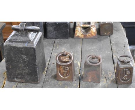 A Collection of Four Cast Iron Vegetable Scale weights 
