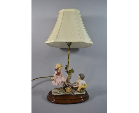 A Late 20th Century Capodimonte Figural Table Lamp, Children on Seesaw 