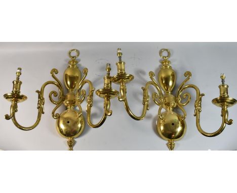 A Pair of Dutch Style Brass Two Branch Wall Hanging Light Fittings 