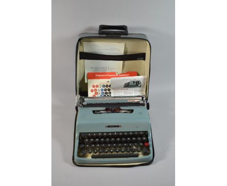 A Vintage Cased Letter 32 Manual Portable Typewriter with Instructions 