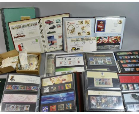 A Collection of 4 Albums of First Day Covers, Two Albums of Stamps and a Stamp Stock Book 