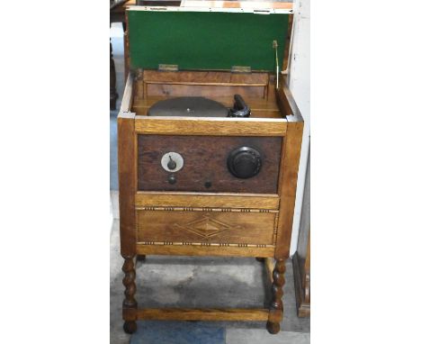 A Vintage Oak Cased Radiogram on Barley Twist Supports, 53cm wide 