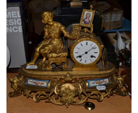 A gilt metal and porcelain mounted mantel clock signed Hry Mark