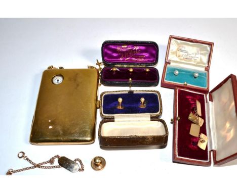 A bracelet with name tag, stamped '9CT'; a pair of 9 carat gold cufflinks; a 9 carat gold stud; a pair of pearl studs, cased,