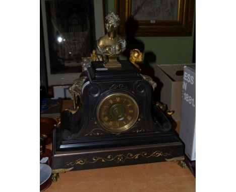 A black slate mantel clock