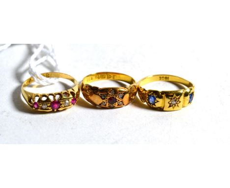 An 18 carat gold Victorian ruby and diamond set ring, finger size L; a sapphire and diamond set ring, stamped '18CT', finger 