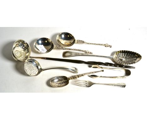 A silver replica anointing spoon by Saunders &amp; Shepherd; a pair of silver apostle top spoon; a George III silver tablespo