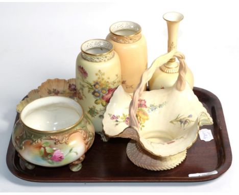 A group of Royal Worcester blush ground porcelain wares comprising: a pin dish, bottle vase, basket, pair of cylindrical vase
