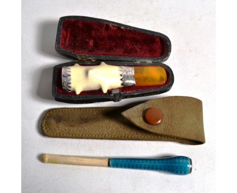 An amber cheroot holder, cased; and a blue enamel and ivory cigarette holder in case (2) 