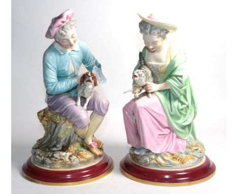 A pair of Royal Worcester figures 'Cat' and 'Dog', number 571, modelled as a lady and gentleman seated, each with a faithful 